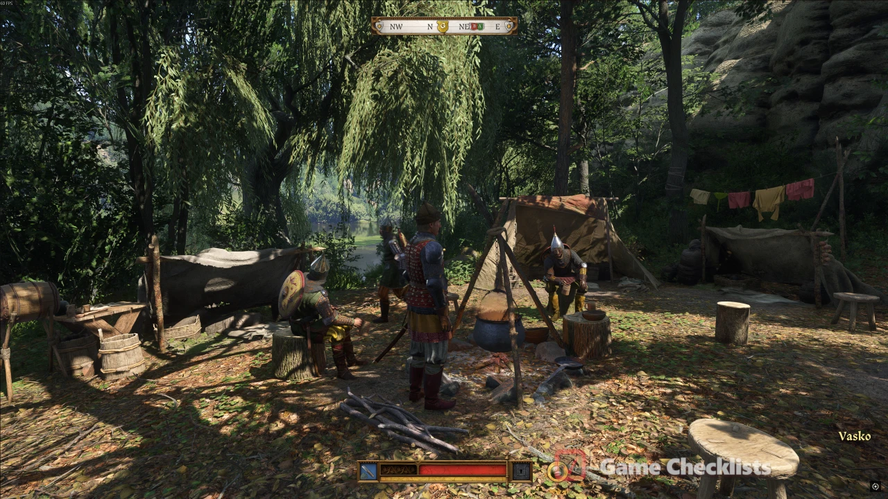 kcd2-cuman-camp3: Cuman tents and campfire inside the rocky crevice encampment
