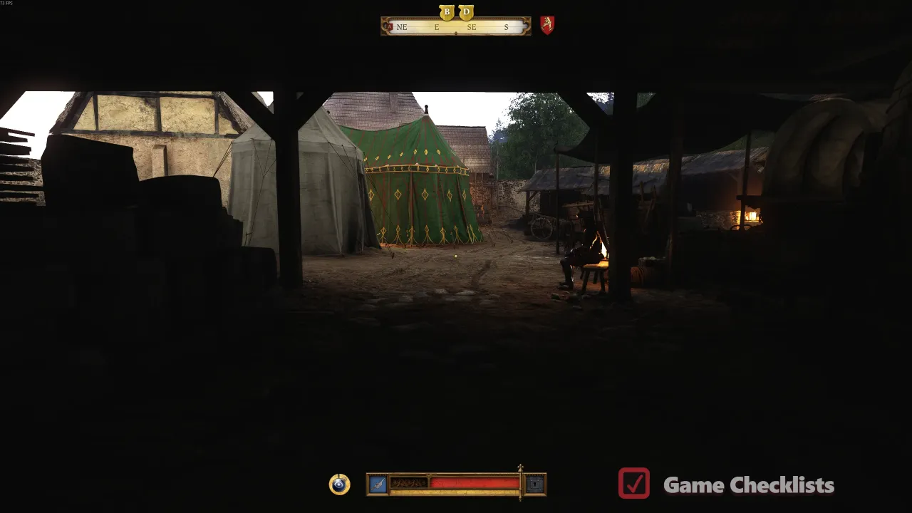 Stone brick building with guards near the warehouse tents