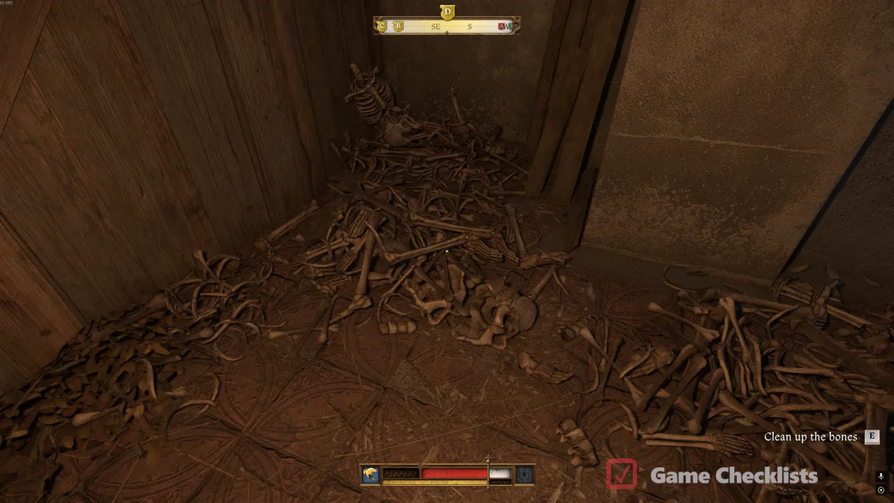 Cleaning bone piles on the main ossuary floor